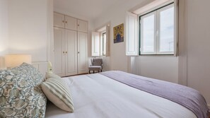 Iron/ironing board, free WiFi, bed sheets - Bright 3BDR Flat in Iconic Graça by LovelyStay (Lisboa)