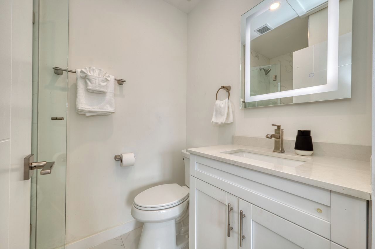 Shower, towels, soap, toilet paper