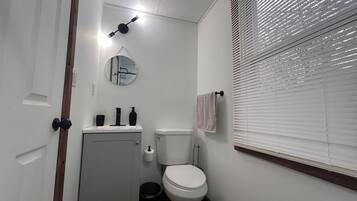 Shower, towels, soap, toilet paper