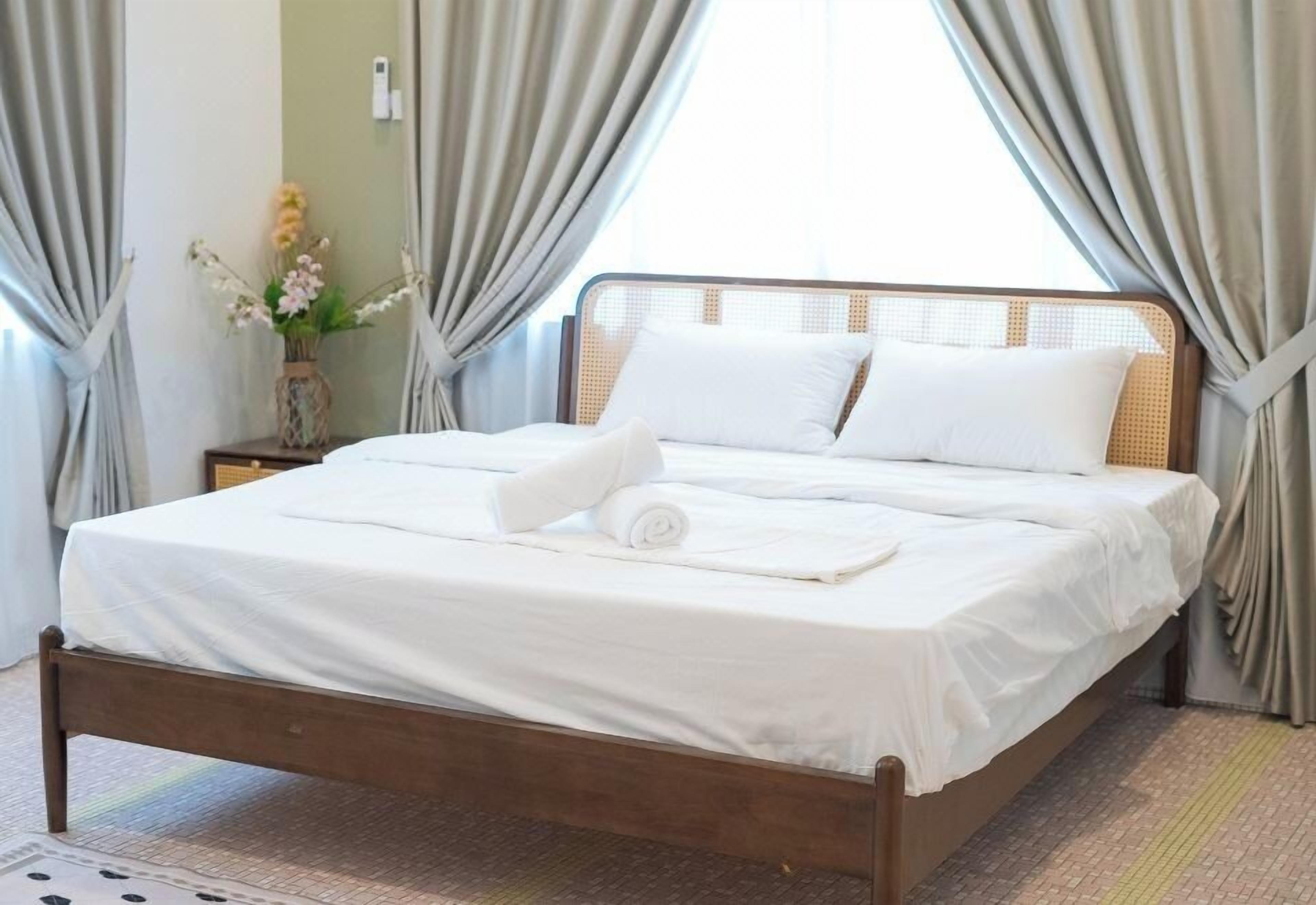 Habitación Deluxe con 1 cama doble o 2 individuales | Tabla de planchar con plancha