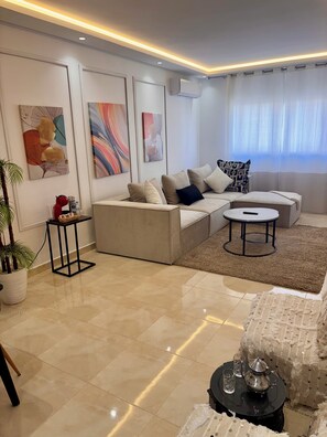 Living area - Stylish & Cozy | Downtown 2BR Netflix+Fast Wifi•AC (rabat)