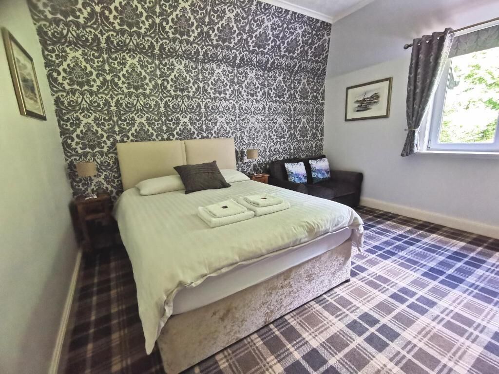 Deluxe Double Room, Garden View | In-room safe, iron/ironing board, free WiFi