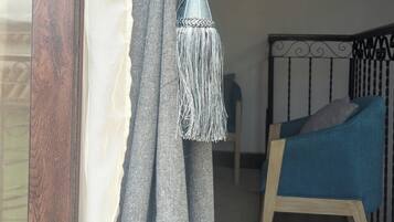 Deluxe Apartment, Balcony, Mountain View | Living area