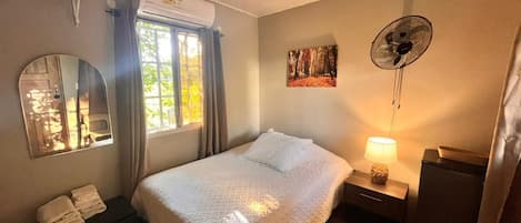 Chambre Confort, véranda, vue jardin