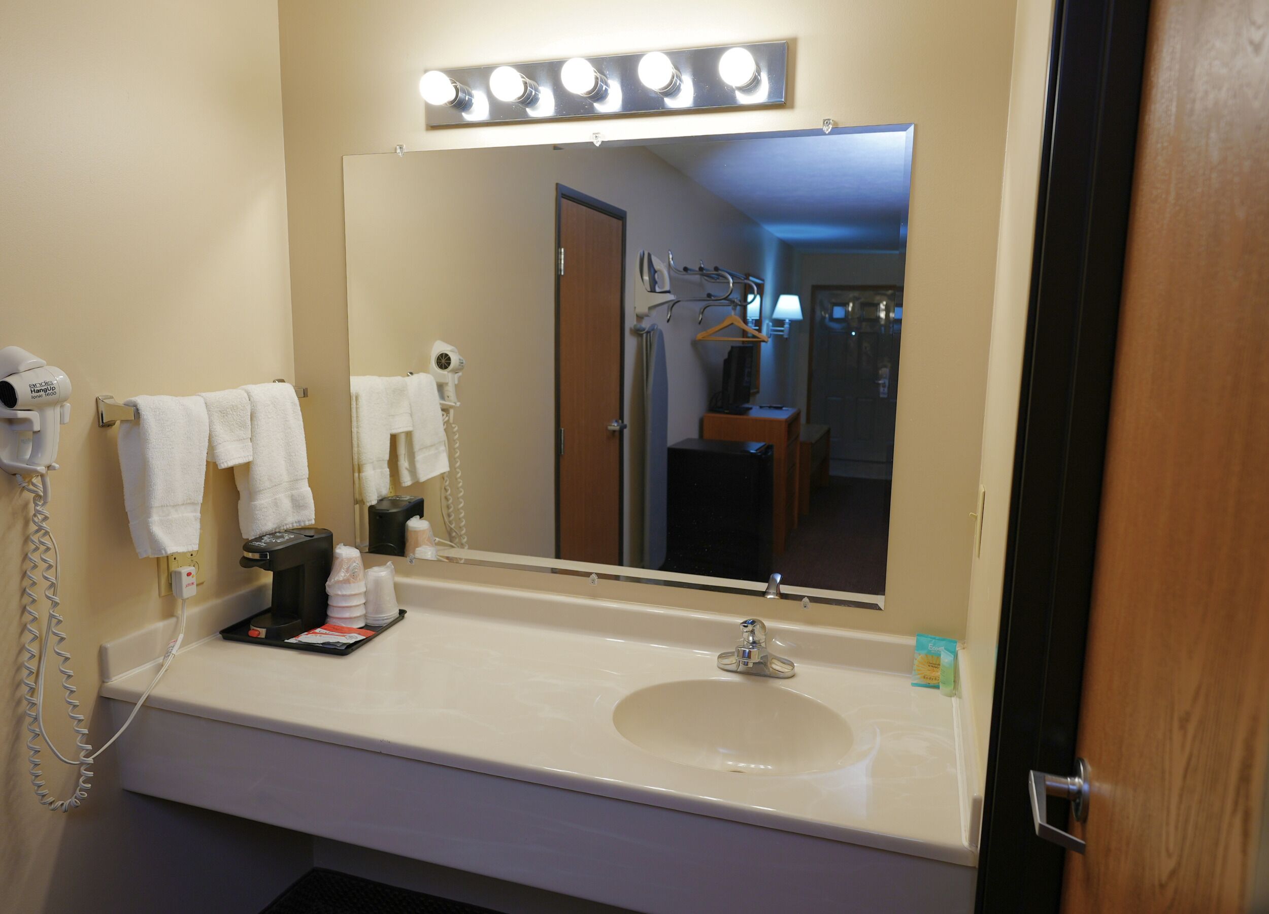 Hair dryer, towels, soap, shampoo