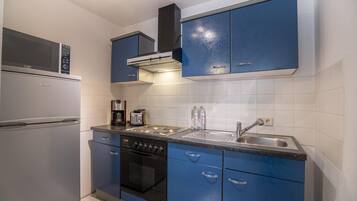 Suite, 2 Einzelbetten, Kochnische (Separate Living Room) | Eigene Kochnische | Wasserkocher mit Kaffee-/Teezubehör