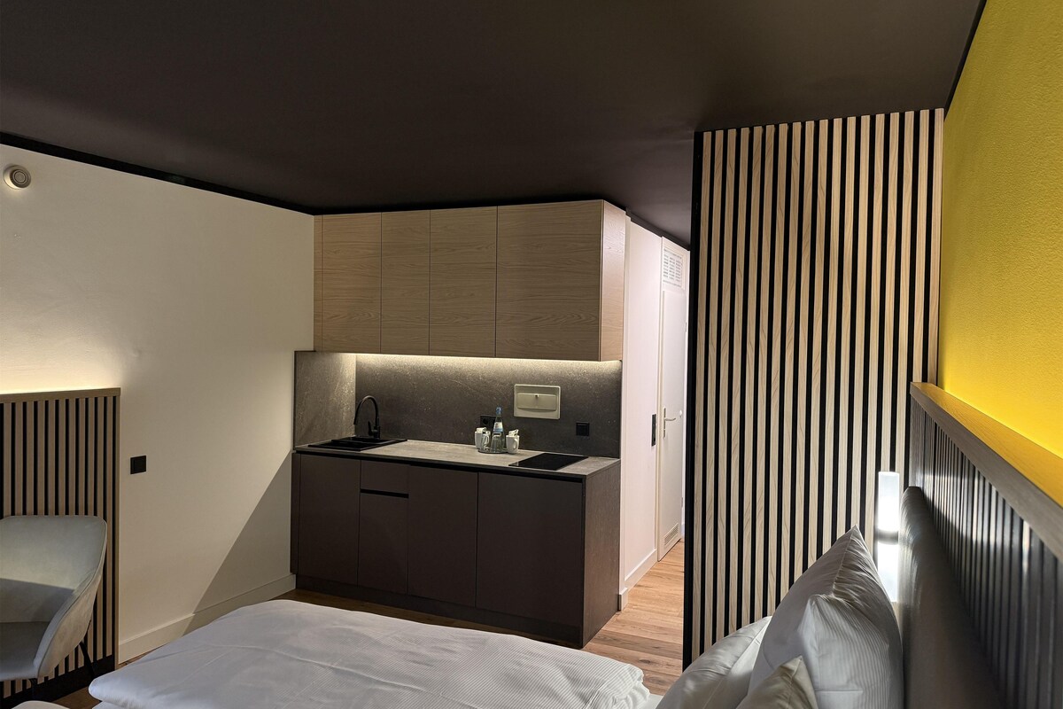 Hypo-allergenic bedding, down duvets, desk, soundproofing