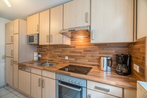 Habitación familiar, varias camas, cocineta (Separate Living Room;with Sofabed)