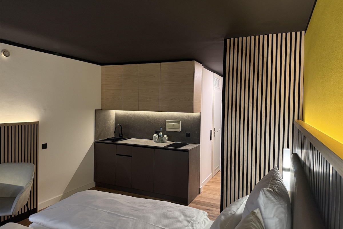 Hypo-allergenic bedding, down duvets, desk, soundproofing