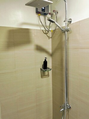 Shower, towels, toilet paper