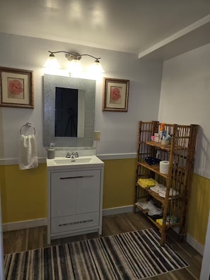Hair dryer, towels, soap, shampoo