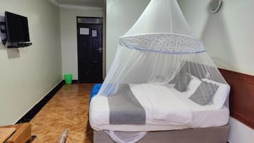 Kahden hengen deluxe-huone, näköala puutarhaan | Ilmainen Wi-Fi, vuodevaatteet