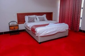 Kahden hengen deluxe-huone, näköala puutarhaan | Ilmainen Wi-Fi, vuodevaatteet