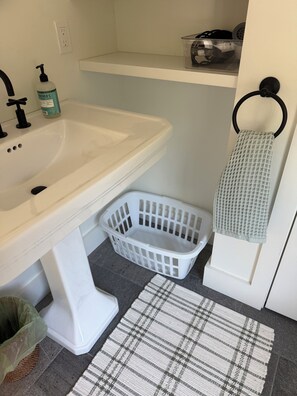 Hair dryer, towels, soap, toilet paper