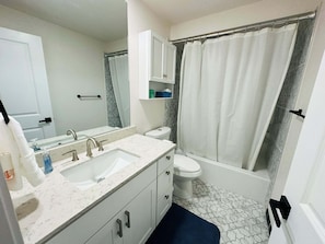 Hair dryer, towels, soap, toilet paper