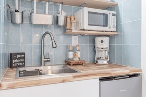 Fridge, microwave, coffee/tea maker, toaster