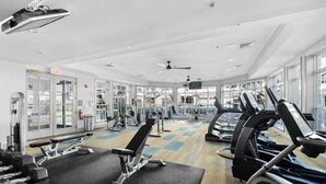 A gym with treadmills, weight machines, and exercise mats. - Landing Apartments New York  (Raritan)