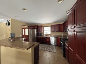 Private kitchen - Cozy + Modern 3BR Home in Bradley, IL — Close to Kankakee & Bourbonnais! (Bradley)