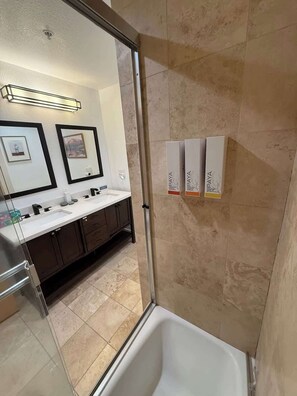 Shower, hair dryer, towels