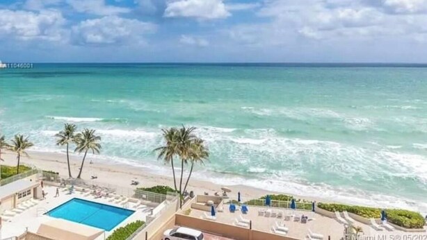 A resort with a pool, beach, and ocean view. - private balcony ON THE BEACH with pool 24hr front desk parking spot laundry gym (Hallandale Beach)