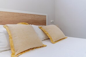 Acesso à internet, roupa de cama