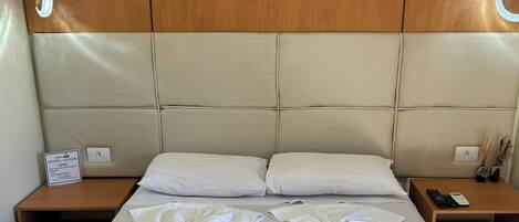 Desk, laptop workspace, free WiFi, bed sheets