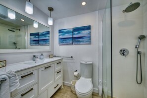 Shower, towels, soap, toilet paper