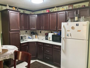 Fridge, microwave, coffee/tea maker, toaster