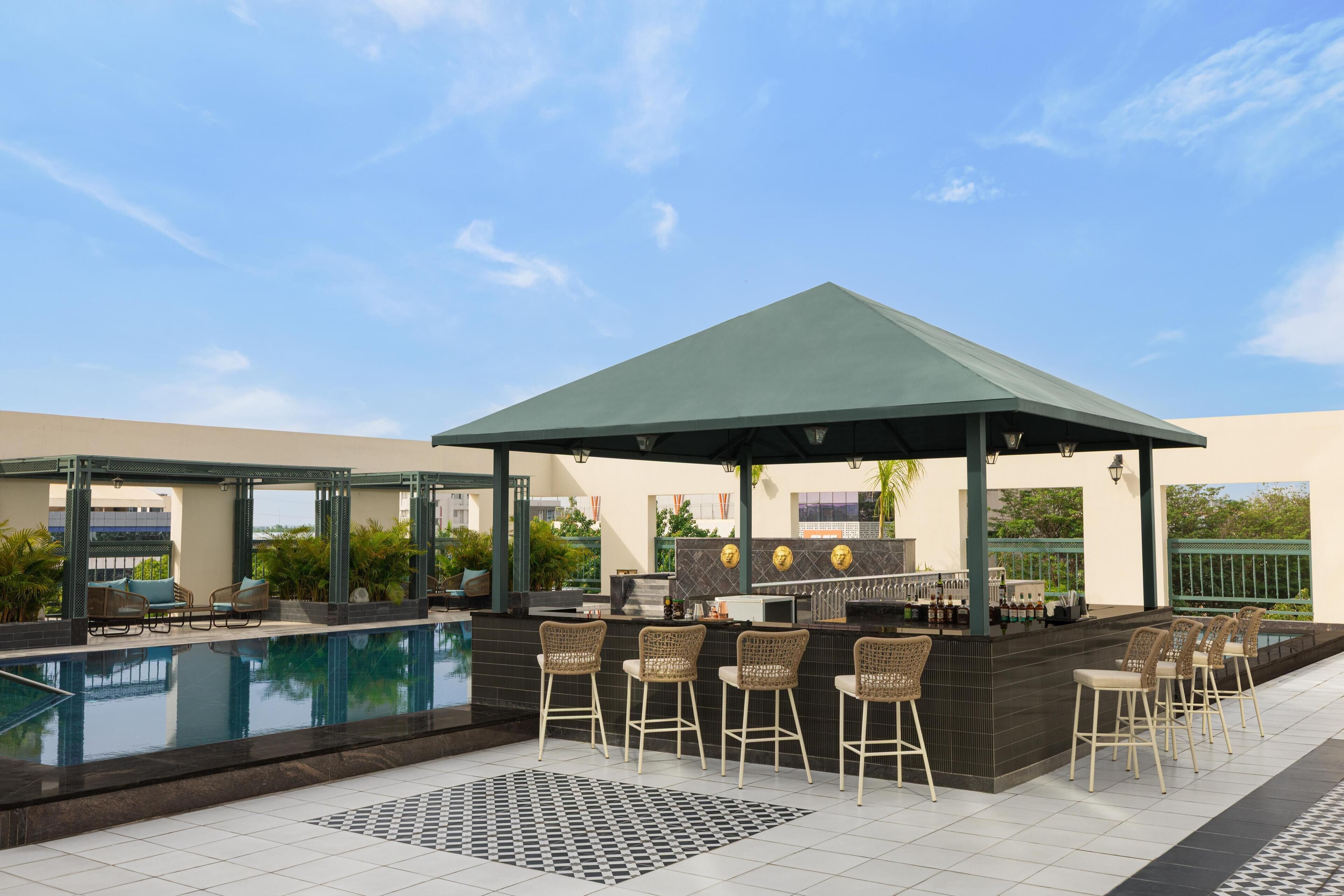 Outdoor pool, open 8:00 AM to 8:00 PM, free cabanas, sun loungers