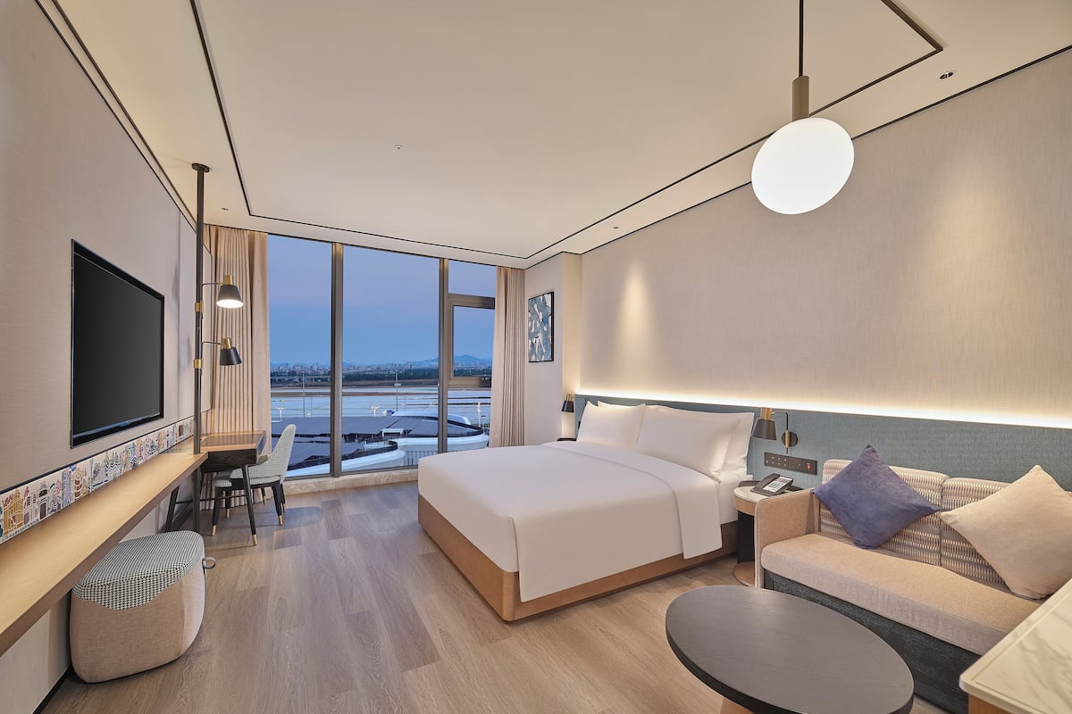 Zimmer, 1 King-Bett | Daunenbettdecken, Zimmersafe, Verdunkelungsvorhänge