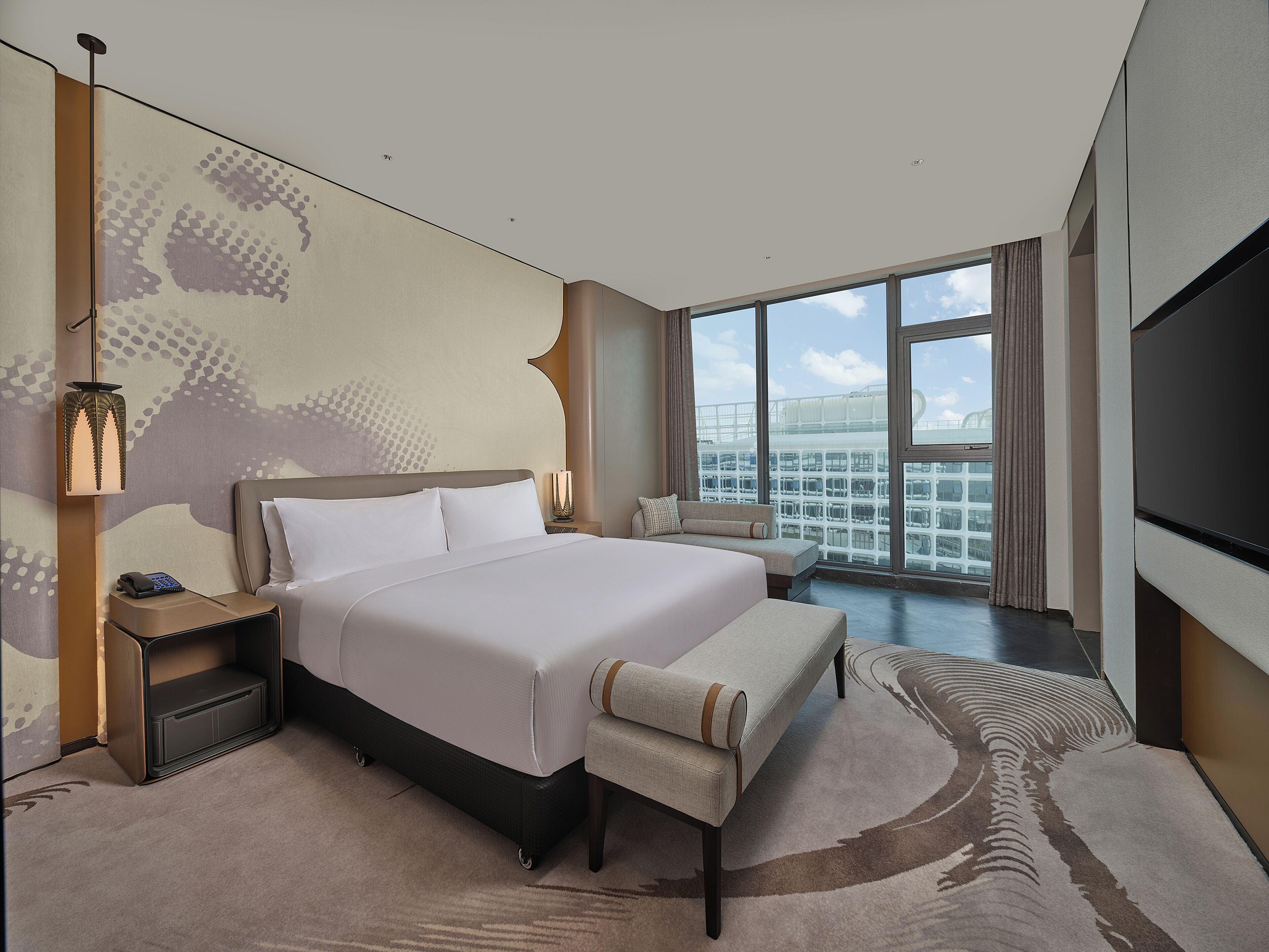 Cubrecamas, caja de seguridad en la habitación y cortinas blackout 