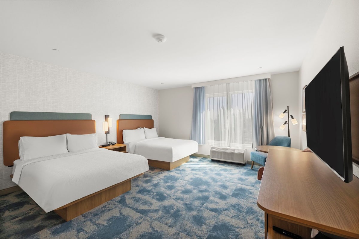 Down comforters, desk, laptop workspace, blackout drapes