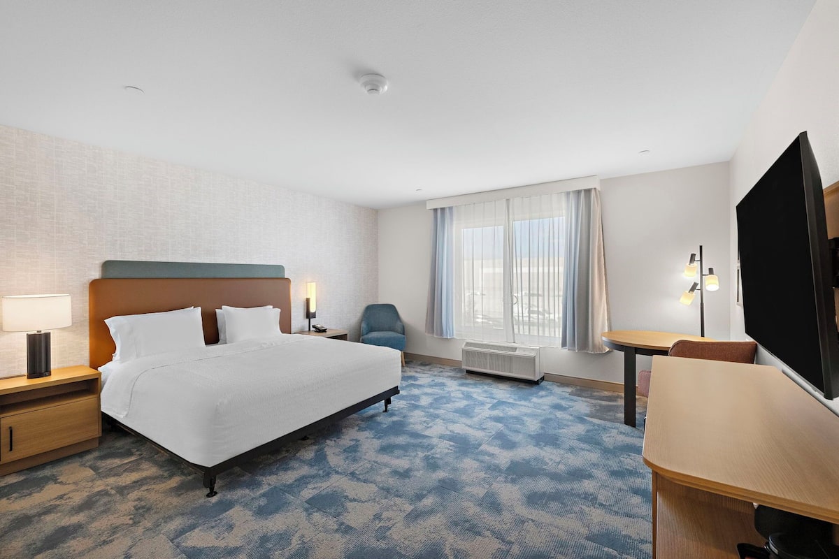 Down comforters, desk, laptop workspace, blackout drapes