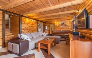 TV, fireplace - Nice home in Gornje Dubrave with sauna (Gornje Dubrave)
