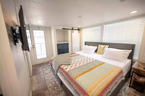 2 habitaciones, tabla de planchar con plancha y cuna de viaje 