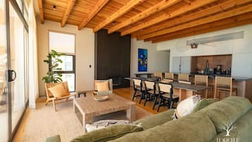 Family Penthouse, 3 Bedrooms, Beach View, Beachfront | Living area | TV
