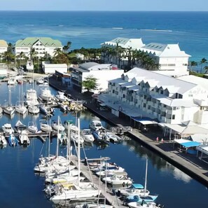 Marina - Charming studio overlooking Saint-François marina, golf course, lagoon & beach on foot. (Saint-François)
