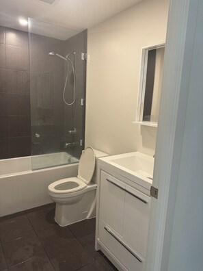 Hair dryer, towels, soap, toilet paper