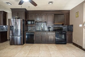 Fridge, microwave, oven, stovetop - Beautiful Mediterranean Home in Mesilla Park (Mesilla Park)