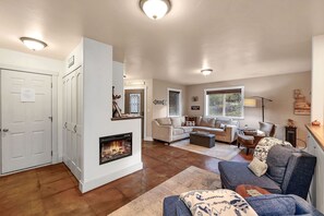 TV, fireplace, books