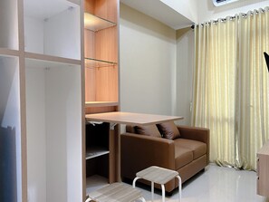 Standard Single Room | Living area - Minimalist And Enjoy Living 1Br Vasanta Innopark Apartment (Cikarang)
