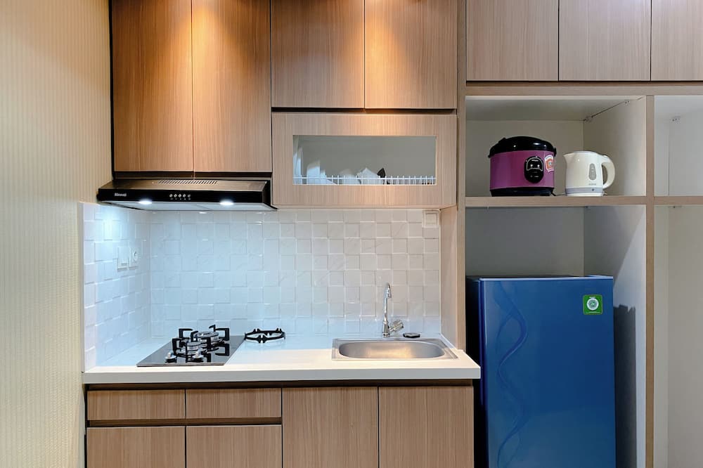 Minimalist And Enjoy Living 1Br Vasanta Innopark Apartment