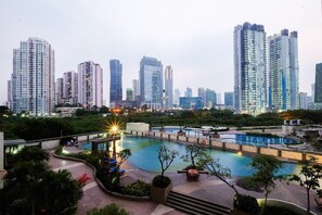 Outdoor pool - Stunning And Comfortable 2Br At The Wave Kuningan Apartment (Jakarta)