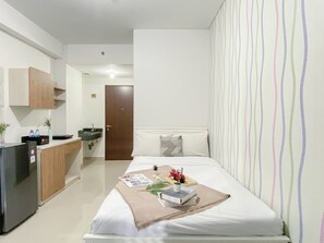 Standard Studio - Modern Neutral Studio Room Transpark Cibubur Apartment (Depok)