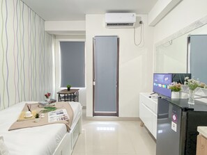 Standard Studio - Modern Neutral Studio Room Transpark Cibubur Apartment (Depok)