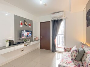 Standard Apartment | Living area - Cozy Neutral 2Br Apartment At Transpark Juanda Bekasi Timur (Bekasi)