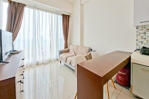 Standard Apartment | Living area - Simple Look 1Br Apartment At Tree Park City Bsd (Tangerang)