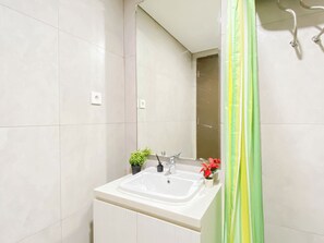 Standard Studio | Bathroom - Cream Toned And Compact Studio Apartment Pollux Chadstone (Cikarang)