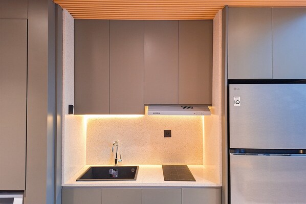 Standard Apartment | Private kitchen - Industrial Modern 1Br Loft At Apartment Collins Boulevard (Tangerang)