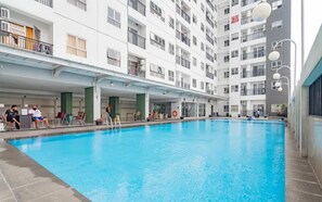 Outdoor pool - Homey And Restful 2Br At Mekarwangi Square Cibaduyut Apartment (Bandung)